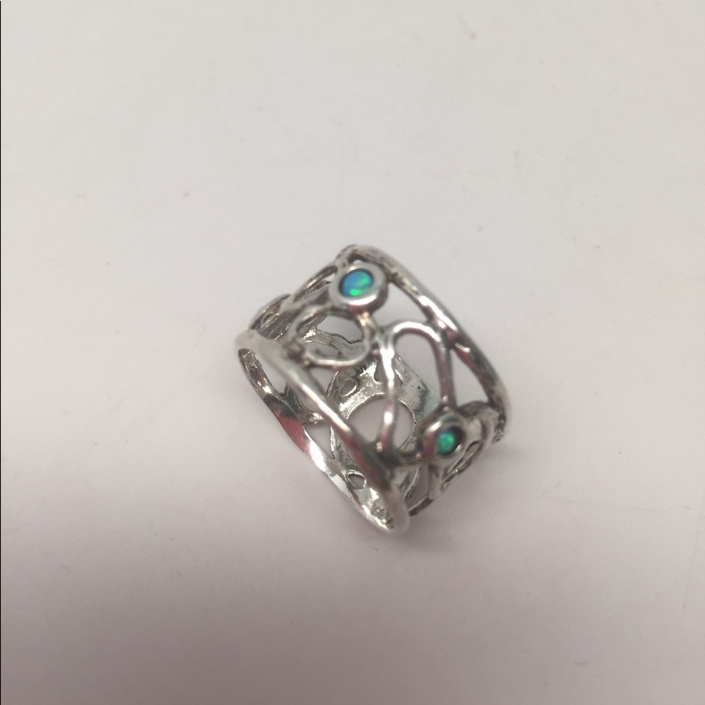 Sterling Silver .925 Band Ring w/Blue Fire Opals. Never been worn.